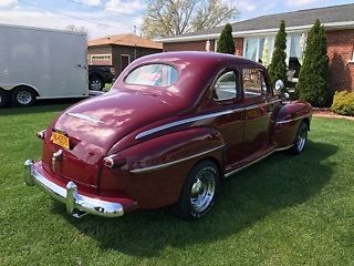 1947 Burgundy Ford Super Deluxe Coupe