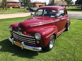 1947 Burgundy Ford Super Deluxe Coupe