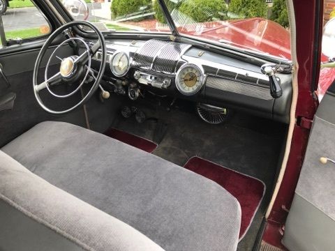 1947 Burgundy Ford Super Deluxe Coupe