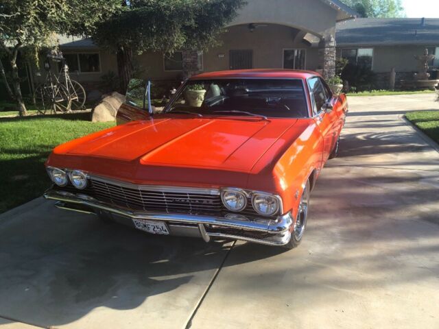 1965 Orange Chevrolet Impala