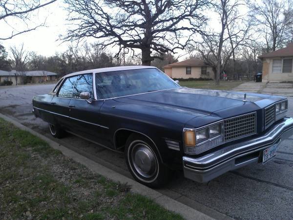 1976 Red Orange with Cream top Oldsmobile Ninety-Eight Sedan