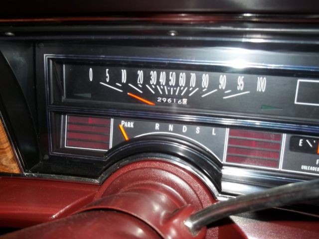 1976 Red Orange with Cream top Oldsmobile Ninety-Eight Sedan