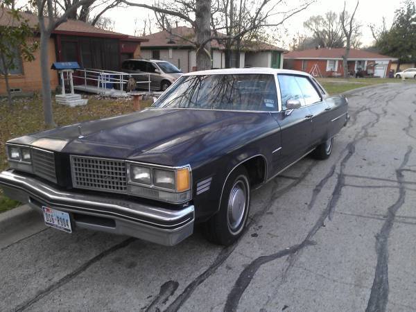 1976 Red Orange with Cream top Oldsmobile Ninety-Eight Sedan