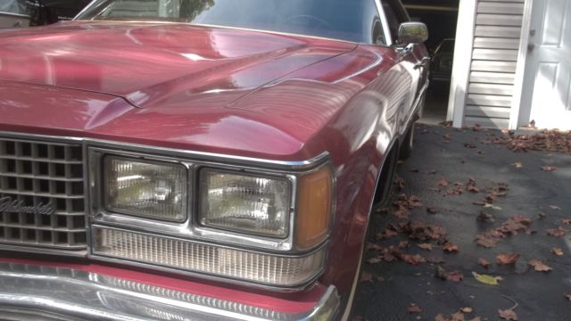 1976 Red Orange with Cream top Oldsmobile Ninety-Eight Sedan