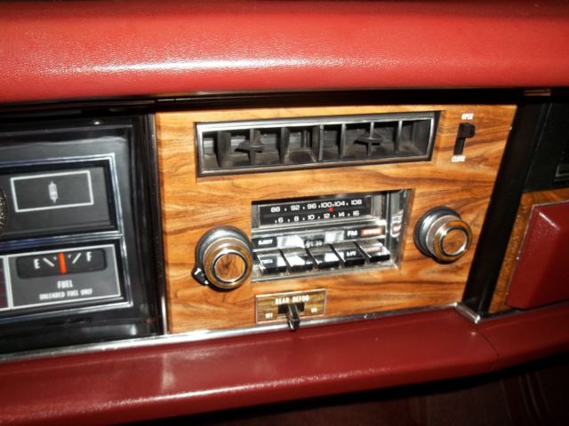 1976 Red Orange with Cream top Oldsmobile Ninety-Eight Sedan