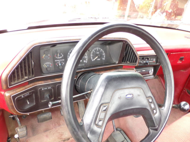 1988 red Ford F-150 Standard Cab Pickup