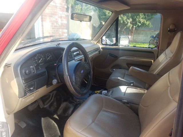 1993 Burgundy Ford Bronco SUV