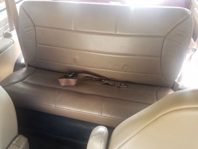 1993 Burgundy Ford Bronco SUV
