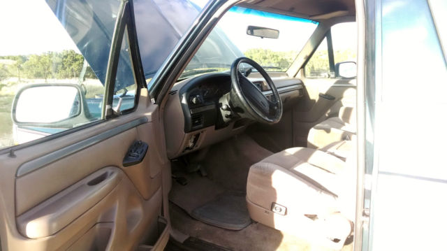 1994 White and Blue Ford Bronco SUV