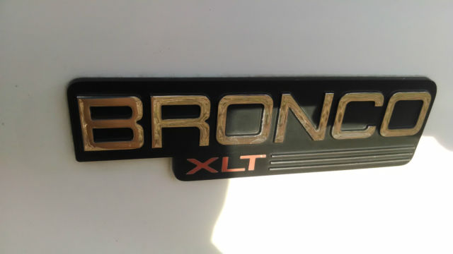 1994 White and Blue Ford Bronco SUV