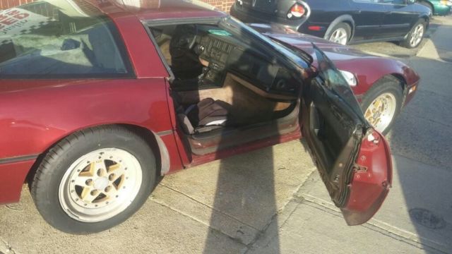 1984 Red Chevrolet Corvette T-tops