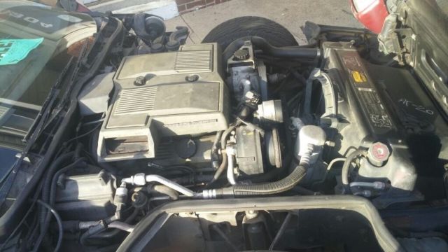 1984 Red Chevrolet Corvette T-tops