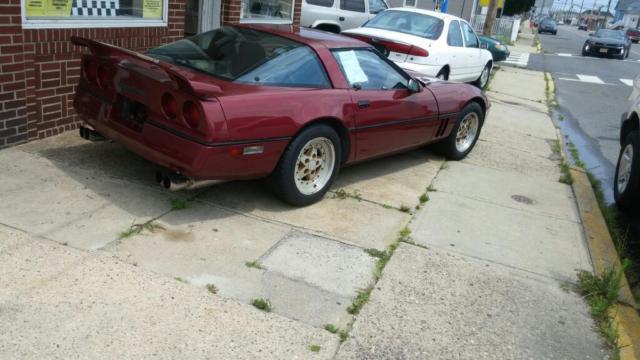 1984 Red Chevrolet Corvette T-tops