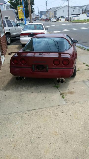 1984 Red Chevrolet Corvette T-tops
