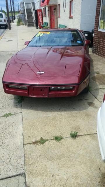 1984 Red Chevrolet Corvette T-tops