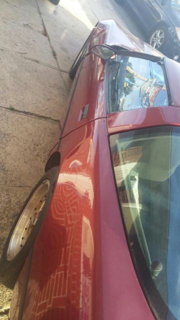 1984 Red Chevrolet Corvette T-tops