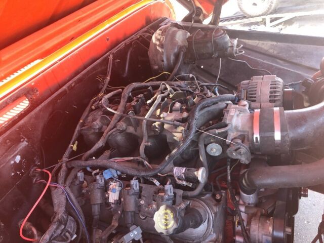 1965 Orange Chevrolet C-10 Standard Cab Pickup