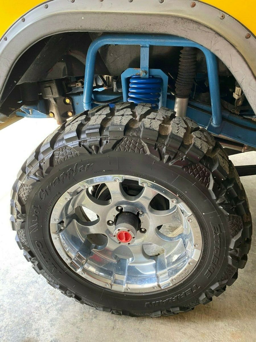 1966 Yellow Ford Bronco SUV