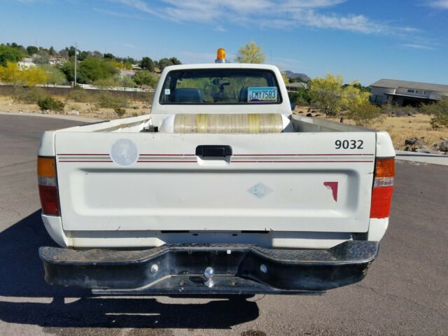 1990 White Toyota Pickup Pickup Truck