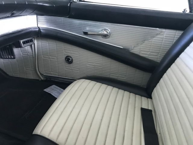 1957 White Ford Thunderbird Convertible