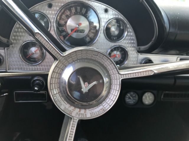 1957 White Ford Thunderbird Convertible