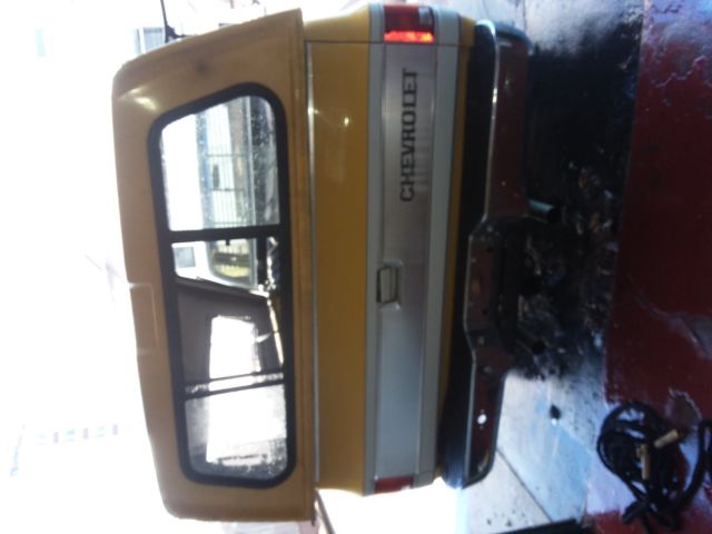 1978 yellow and white Chevrolet C-10 pick up 2 door