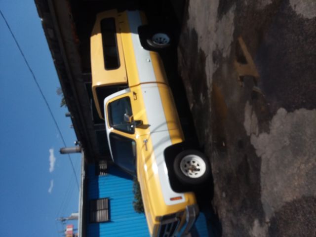 1978 yellow and white Chevrolet C-10 pick up 2 door