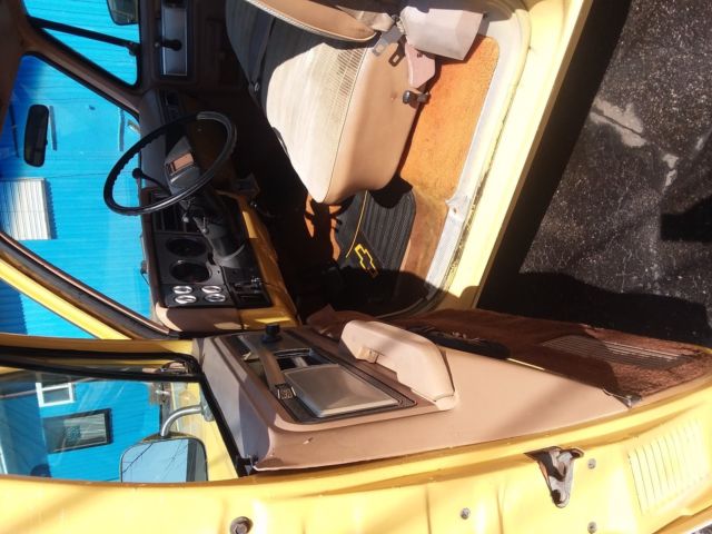 1978 yellow and white Chevrolet C-10 pick up 2 door