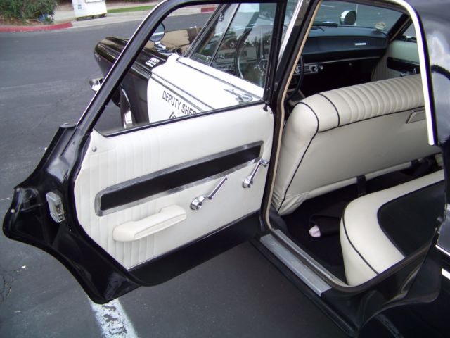 1963 black/white Dodge Polara
