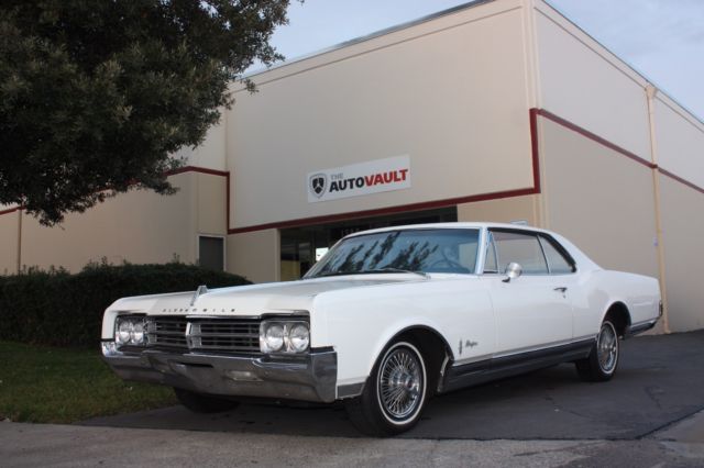 1965 White Oldsmobile Starfire Coupe