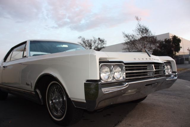 1965 White Oldsmobile Starfire Coupe