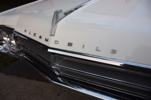 1965 White Oldsmobile Starfire Coupe