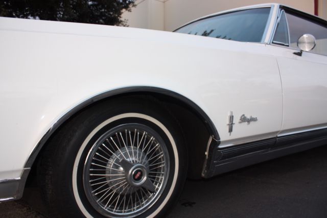 1965 White Oldsmobile Starfire Coupe