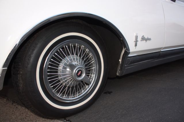 1965 White Oldsmobile Starfire Coupe