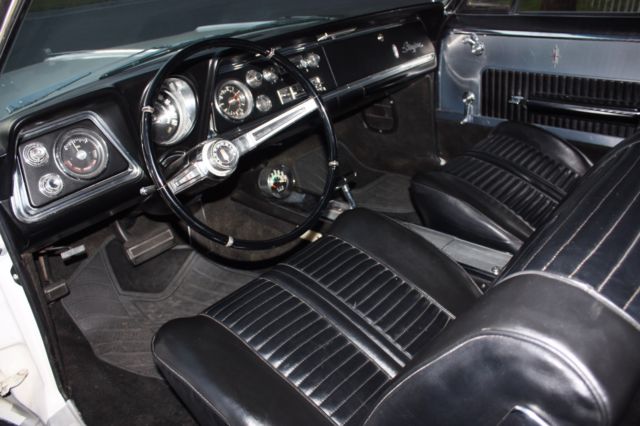 1965 White Oldsmobile Starfire Coupe