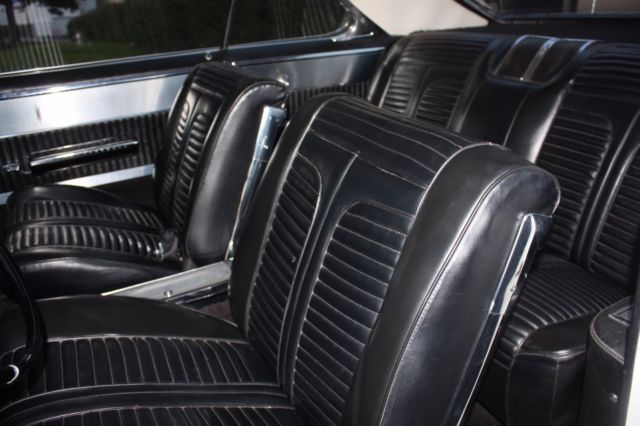 1965 White Oldsmobile Starfire Coupe