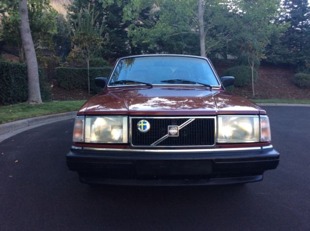 1986 Red Volvo 240 Sedan