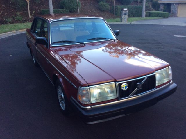 1986 Red Volvo 240 Sedan