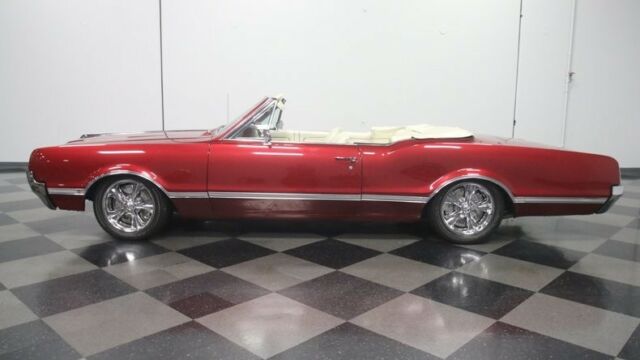 1966 Burgundy Oldsmobile Cutlass Convertible