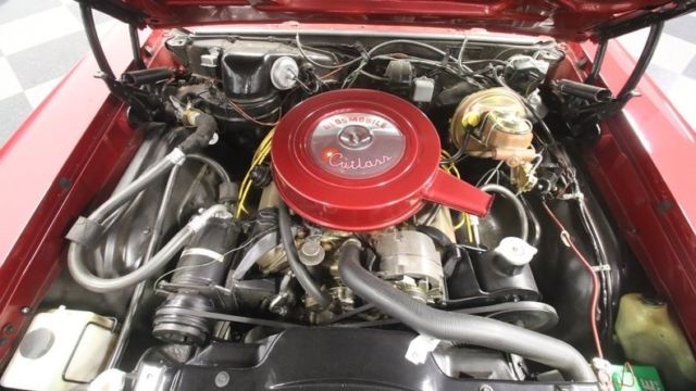 1966 Burgundy Oldsmobile Cutlass Convertible