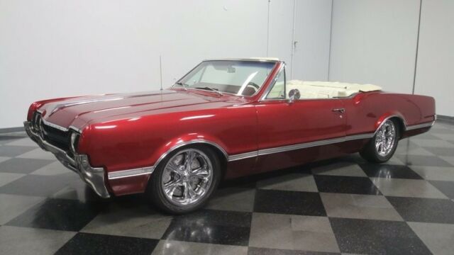 1966 Burgundy Oldsmobile Cutlass Convertible