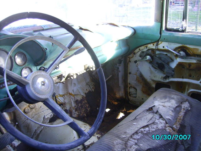 1956 white and turquoise Ford Fairlane 4 dr sta wag station wagon