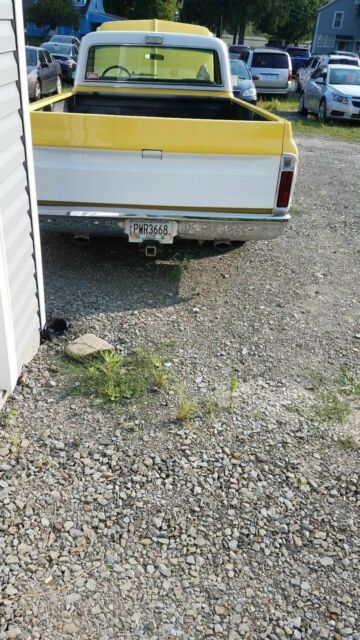 1971 yellow / white Chevrolet C-10 Standard Cab Pickup