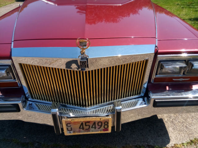 1987 Red Cadillac Brougham Sedan