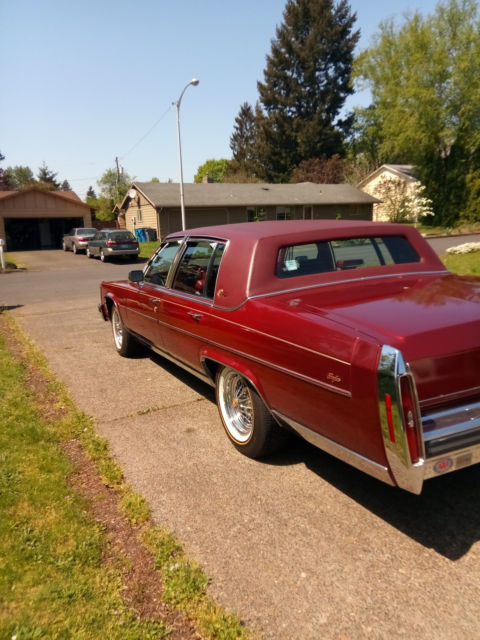 1987 Red Cadillac Brougham Sedan