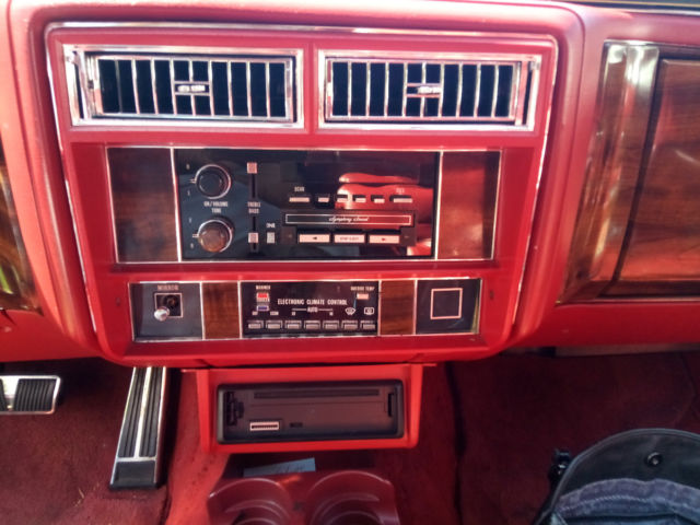 1987 Red Cadillac Brougham Sedan