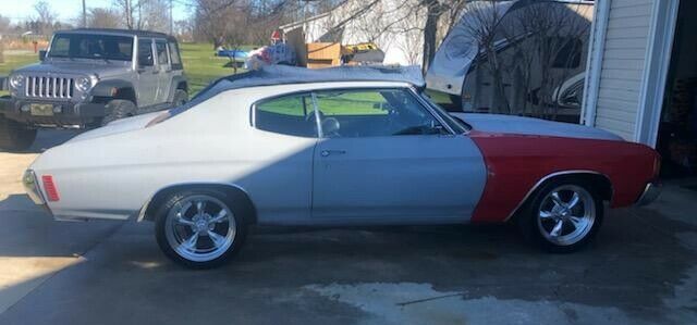 1972 mostly primer Chevrolet Chevelle 2 door Coupe