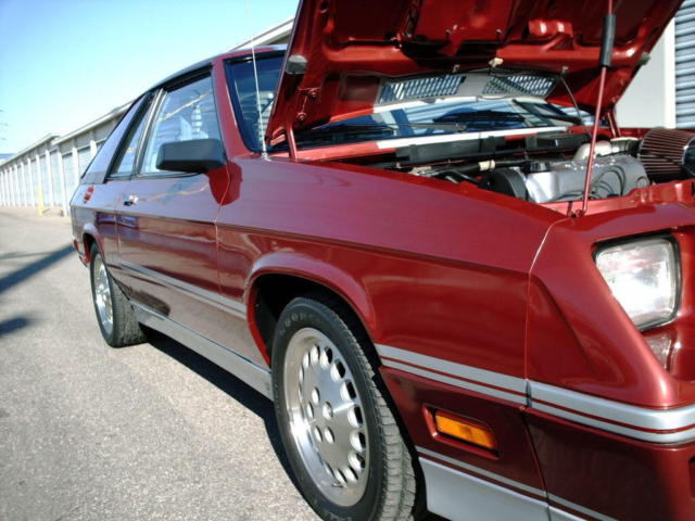 1986 Burgundy Dodge Charger Hatchback