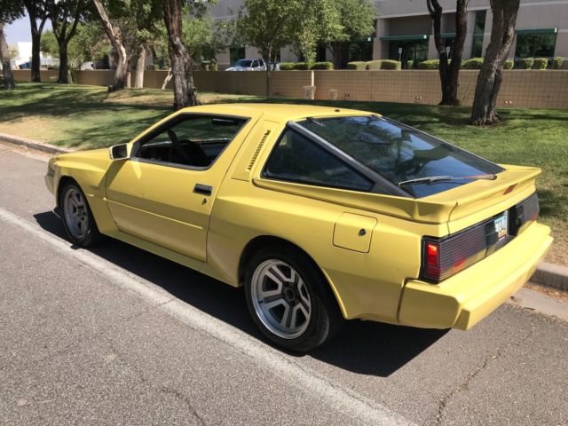 1989 Yellow Chrysler Conquest Hatchback