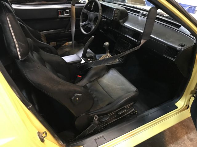 1989 Yellow Chrysler Conquest Hatchback